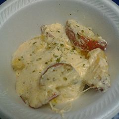 A picture of Cheesy pan potatoes.