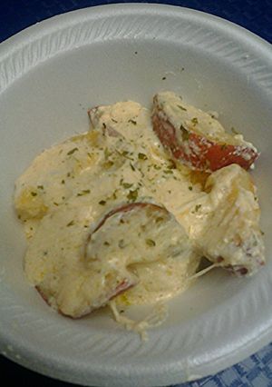 A picture of Cheesy pan potatoes.