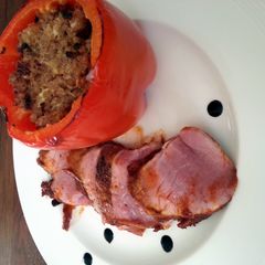 A picture of Swine tenderloin with barleyrice stuffed paprika..