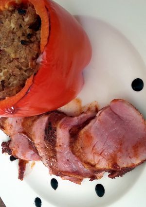 A picture of Swine tenderloin with barleyrice stuffed paprika..