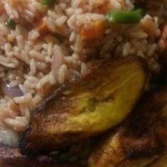 Coconut rice and liver with plantain A picture of Coconut rice and liver with plantain.