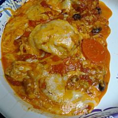 A picture of Cheesy Chicken and Carrots in Tomatoes.