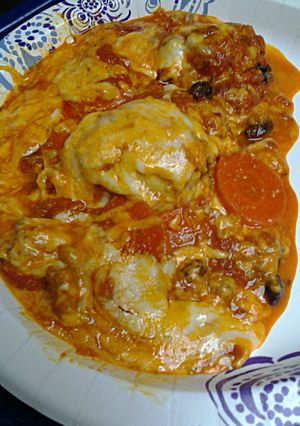 A picture of Cheesy Chicken and Carrots in Tomatoes.
