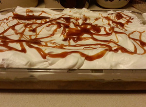A picture of Apple Spice Cake with Homemade Salted Caramel Sauce.