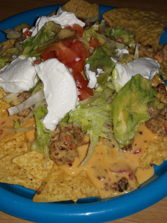 A picture of Yummy Homemade Queso Dip Nachos.