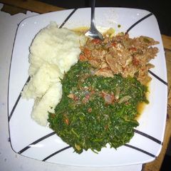 A picture of Ugali, managu and beef.