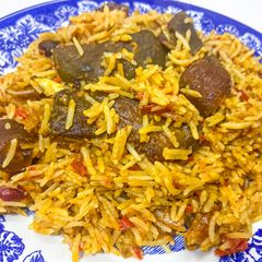 A picture of Goat meat coconut rice.
