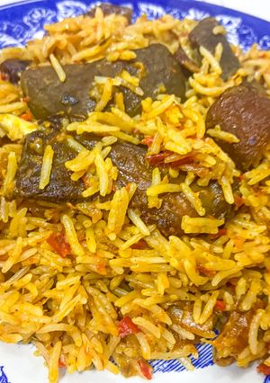 A picture of Goat meat coconut rice.