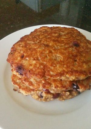 A picture of Banana Pancakes with Blueberries.