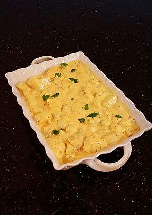 A picture of Potatos and Pearl Onions in Romano Cream Sauce.