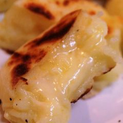 A picture of Double Cheese Rice Flour and Potato Fritters in a Frying Pan.