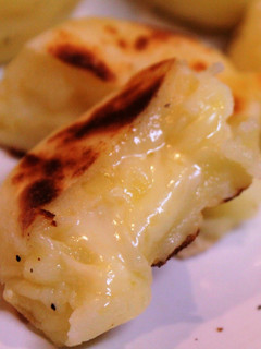 A picture of Double Cheese Rice Flour and Potato Fritters in a Frying Pan.