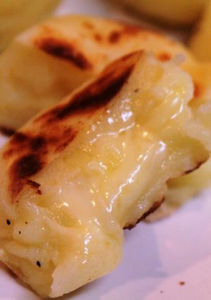 A picture of Double Cheese Rice Flour and Potato Fritters in a Frying Pan.