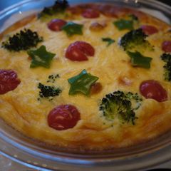 A picture of Broccoli and Tomato Christmas Flan.