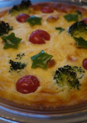 A picture of Broccoli and Tomato Christmas Flan.