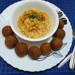 A picture of Falafel with Hummus.