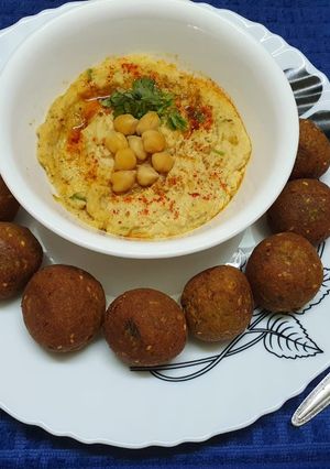 A picture of Falafel with Hummus.