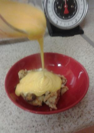 A picture of Rum and Raison Bread pudding, with Custard.