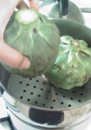 A picture of Authentic ! Artichokes with Hollandaise Sauce.