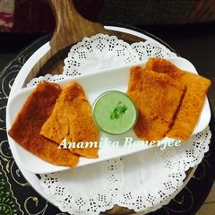 Red Bell Peppers Dosa with Green Bell Peppers & Curd Chutney A picture of Red Bell Peppers Dosa with Green Bell Peppers & Curd Chutney.