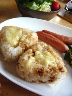 A picture of Easy Broiled Onigiri with Bonito Flakes and Cheese.