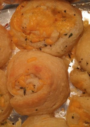 A picture of Cheesy garlic roll ups.