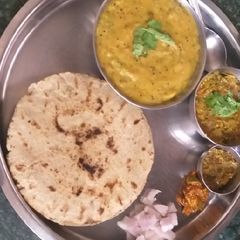 A picture of Zhanzhanit Besan, Bhakri, Bharit theccha.