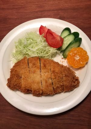 A picture of Crispy and Tender Pork Cutlets with Fresh Breadcrumbs.