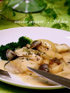 A picture of Cod with Mushroom Cream Sauce.