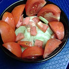 A picture of Maters and cukes.