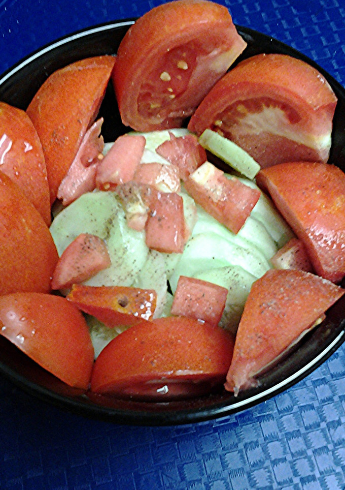 A picture of Maters and cukes.