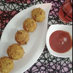 A picture of Sweet corns and zucchini rolls.