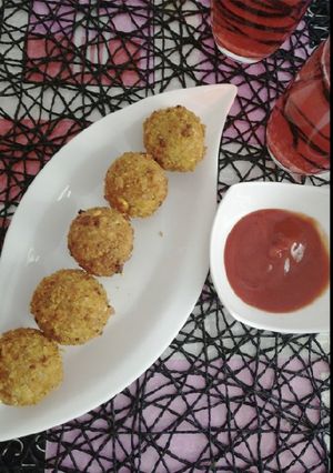 A picture of Sweet corns and zucchini rolls.
