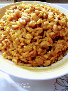 A picture of Jollof Rice and Beans.