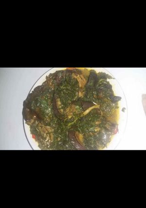 A picture of Vegetable soup with snail.