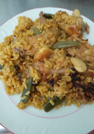 Una foto de Paella a leña