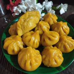 A picture of आंब्याच्या रसातील मोदक (ambyachya rasatil modak recipe in marathi).