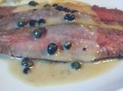 A picture of medium rare flank steak