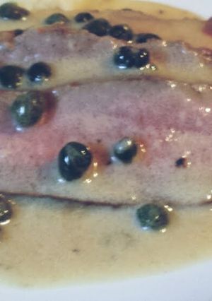 A picture of Flank Steak with Dijon Caper Sauce.
