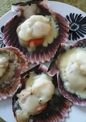 Una foto de Ostiones a la parmesana
