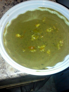 A picture of Black Bean Coconut Soup w/Shrimp.