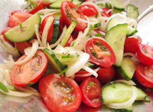 A picture of Simple Tomato Cucumber Salad with Lemon Dressing.