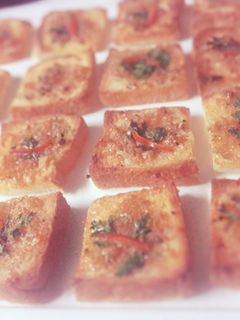 A picture of Crispy Shrimps and Garlic Bread.