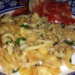 A picture of Portuguese Bacalhau A Bras (salted cod).