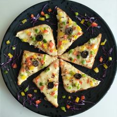 A picture of Garlic Cheese Veggie Toast Open Sandwich.