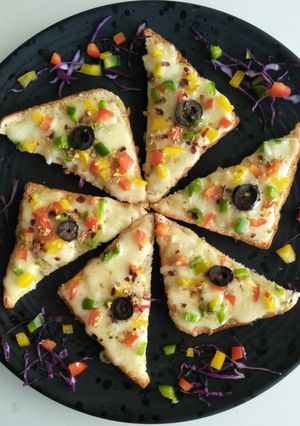 A picture of Garlic Cheese Veggie Toast Open Sandwich.