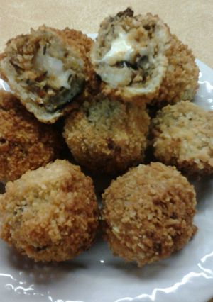 A picture of Crispy Mozerella Stuffed Chipotle Eggplant Fritters.