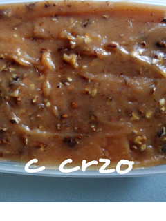 Una foto de Membrillo, manzanas y nueces en microondas