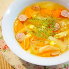 A picture of Consommé Soup with Penne.