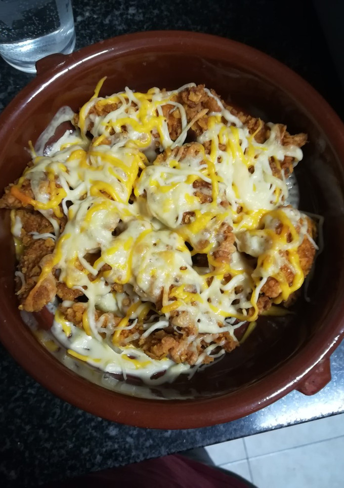 Una foto de Pechugas de pollo con doritos